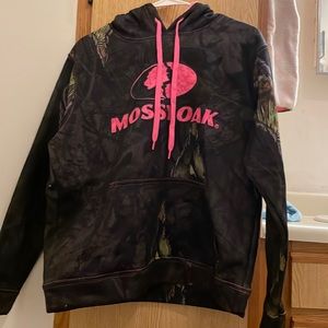 Women’s size medium mossy oak hoodie. It’s kind of like a blackish camouflage.